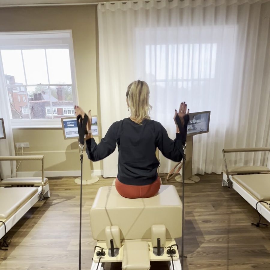 Mandy on the reformer at Reformed Pilates, Chichester